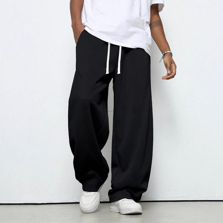 Herren Baggy-Jogginghose im Urban-Utility-Stil mit extra weitem Bein und sichtbarem Kordelzug Drune