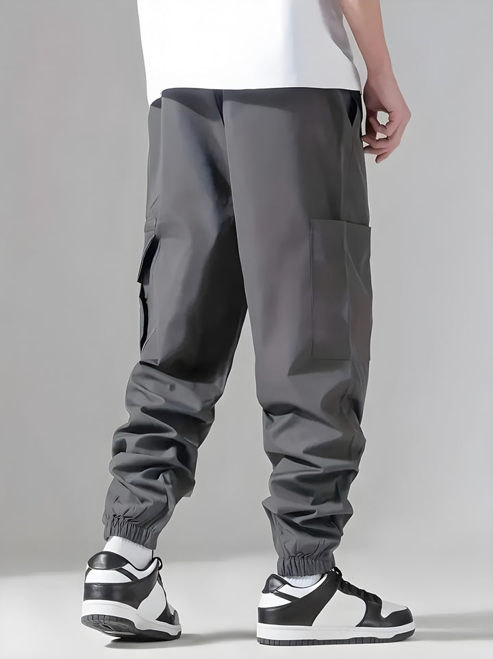 Herren Technische Cargohose im Joggerstil mit elastischem Bund, Reißverschluss-Utilitytasche & Bündchen Drune