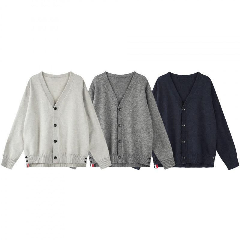 Unisex Oversize V‑Neck Strickcardigan mit Knopfleiste und Seitendruckknöpfen Drune