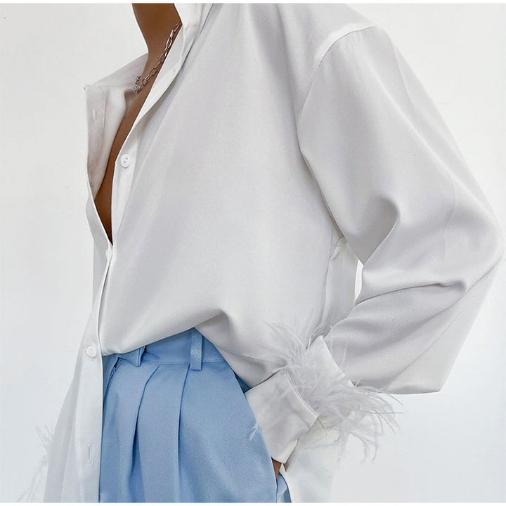 Damen Bluse mit bunten Federn und elegantem Schnitt Drune