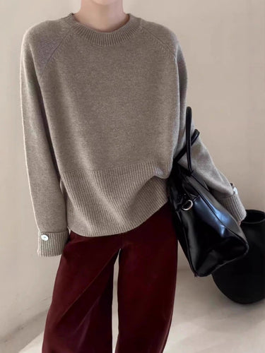Damen Oversize-Rundhalspullover mit verlängerten Manschetten und Zierknopf Drune
