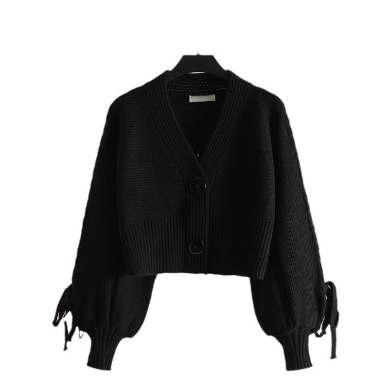 Damen modische Strickjacke mit voluminösen Ärmeln und Knopfdetails Drune