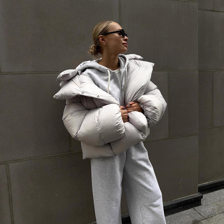 Damen extravagante Oversize Steppdaunenjacke mit extravoluminöser Kapuze Drune