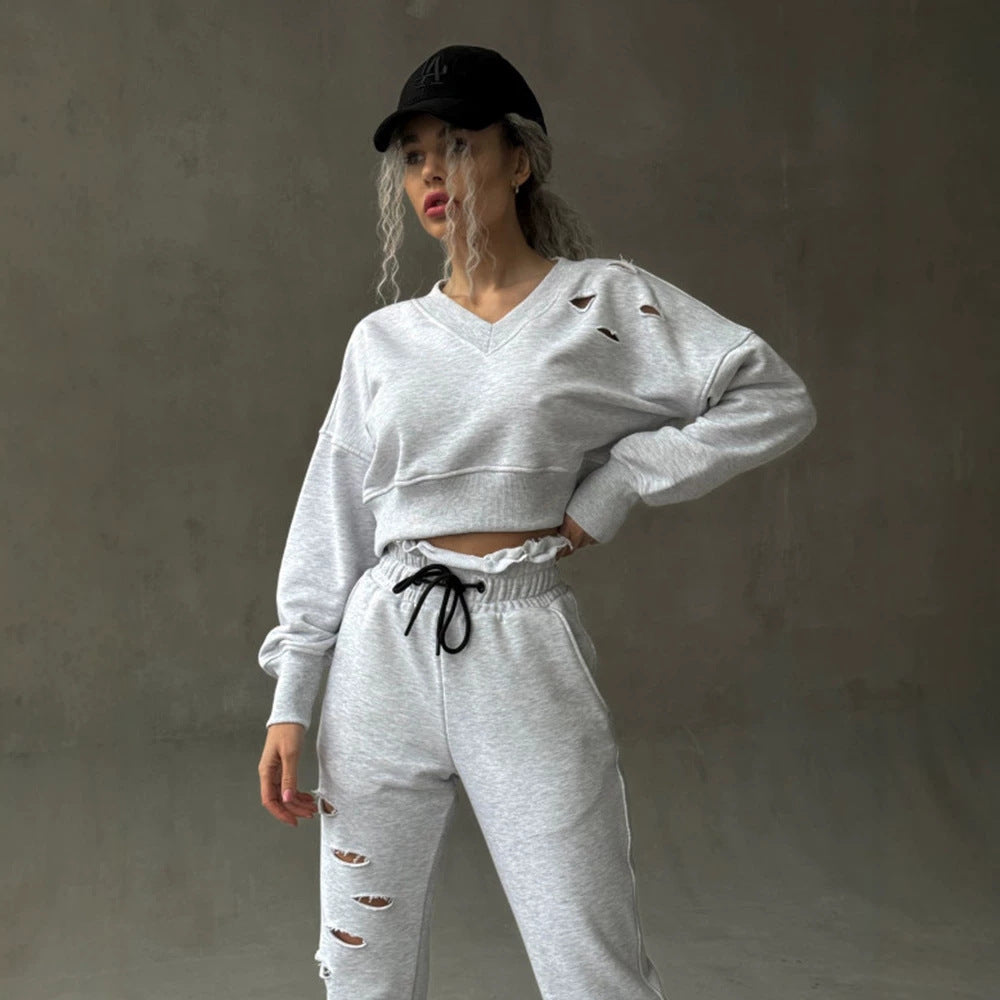 Damen kurzgeschnittenes Sweat-Set mit V-Ausschnitt, Rüschenbund Highwaist Jogginghose und Distressed-Details Drune