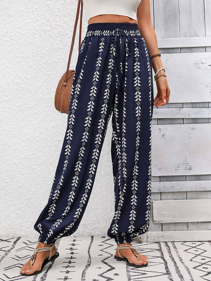 Damen Locker geschnittene Leinenoptik-Hose mit Smokbund, Kordelzug und Ethno-Print Drune