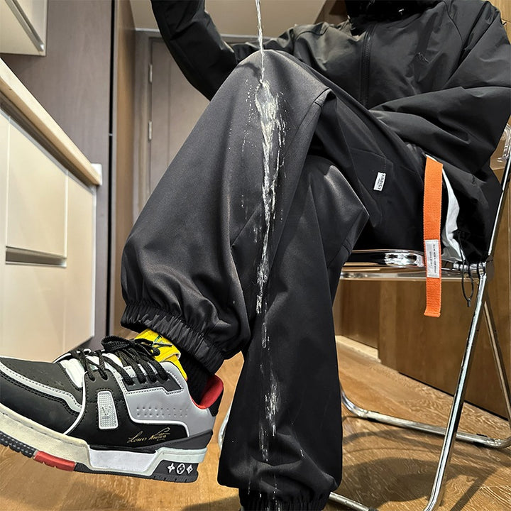 Herren Wasserabweisende Tech-Jogginghose mit elastischem Saum, Kordelzug und robusten Nähten Drune