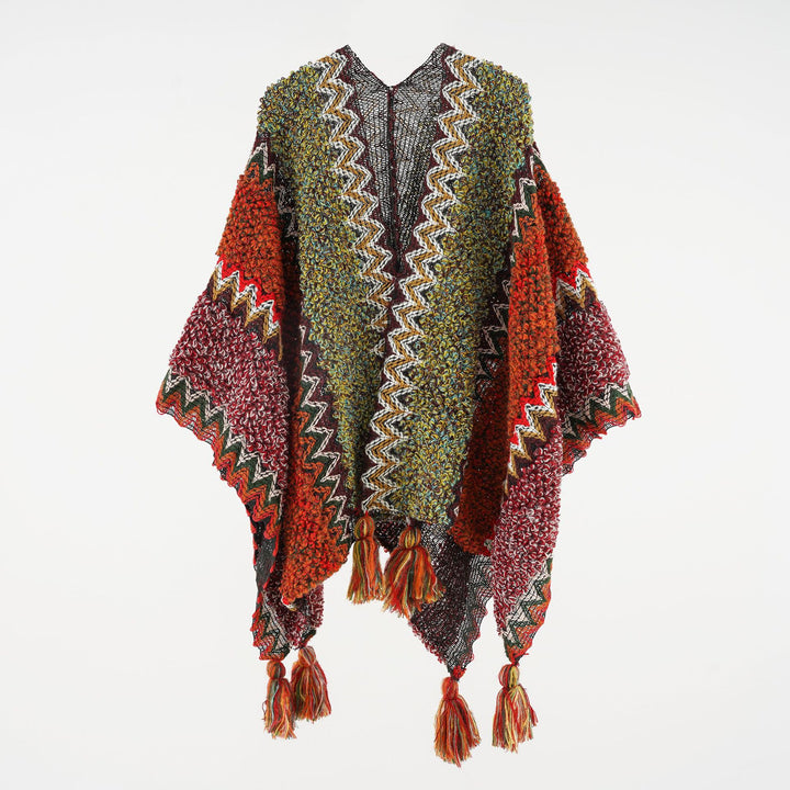 Damen strukturierter Bouclé-Strickponcho mit Jacquardmuster und Quasten Drune