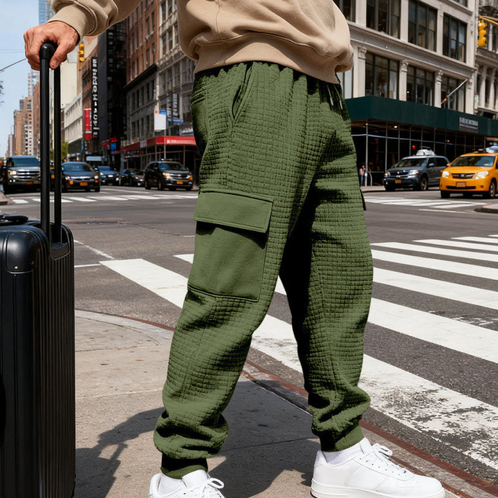 Herren Cargo-Jogginghose mit markanter Waffelstruktur, elastischem Bund und großen Klappentaschen Drune