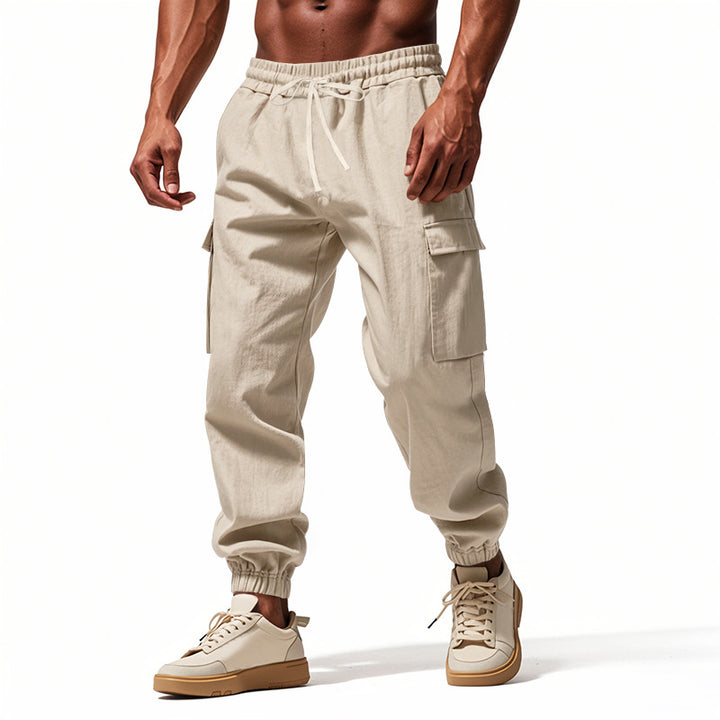Herren nan konisch zulaufende Jogger im utilitarischen Stil mit elastischem Bund, Kordelzug und Klappentaschen Drune