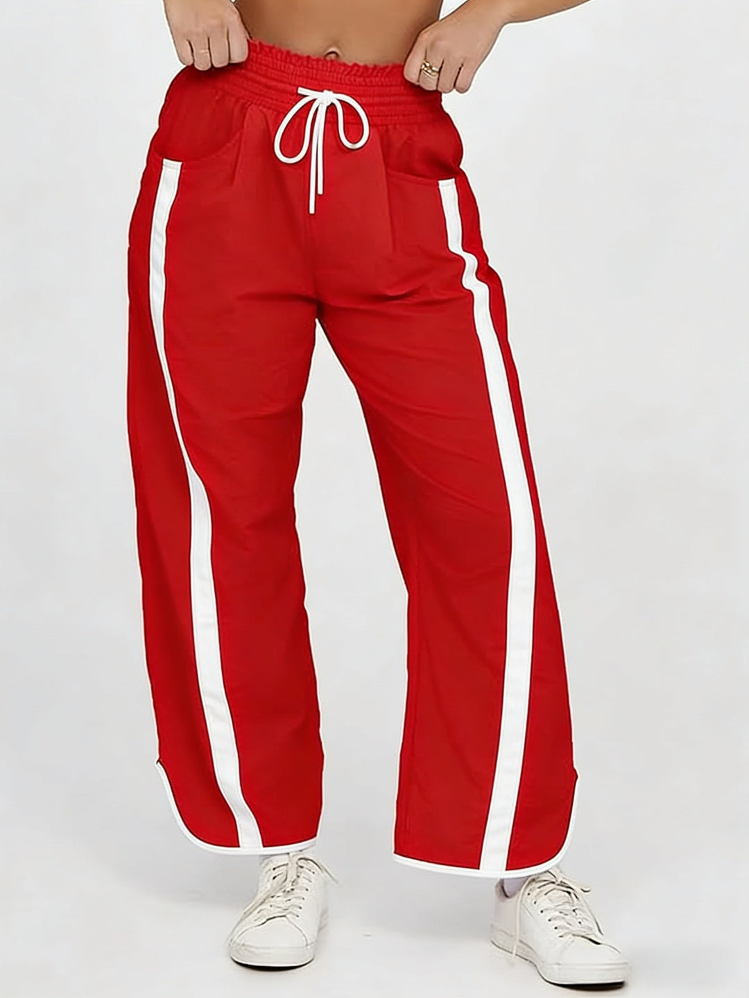Damen nan relaxte Trackpants mit seitlichem Kontraststreifen, elastischem Smokbund und Eingrifftaschen Drune