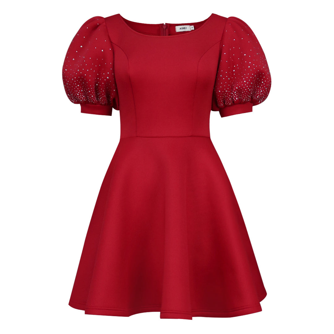 Damen Cocktailkleid mit voluminösen Puffärmeln und schimmernden Akzenten Drune