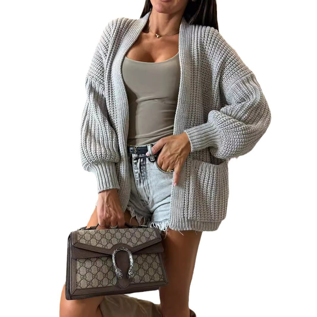 Damen moderne Strickjacke mit voluminösen Ärmeln und Taschen Drune