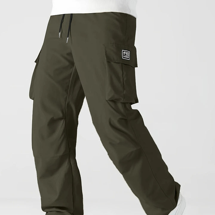Herren Relaxed Cargo-Hose mit Tunnelzugbund, großen Klapp‑Utilitytaschen und geradem Bein Drune