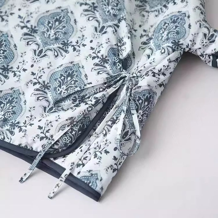 Damen nan Wickeljacke mit orientalischem Medaillonprint, leichter Wattierung und kontrastpaspel Drune
