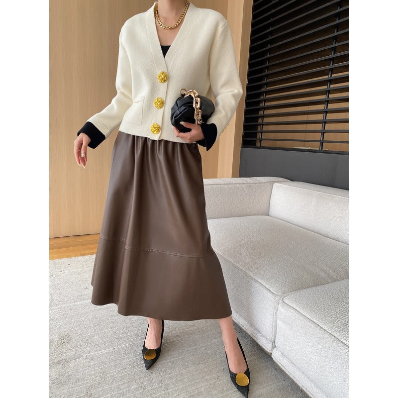 Damen eleganter Cardigan mit Knopfdetails und fließendem Maxirock Drune