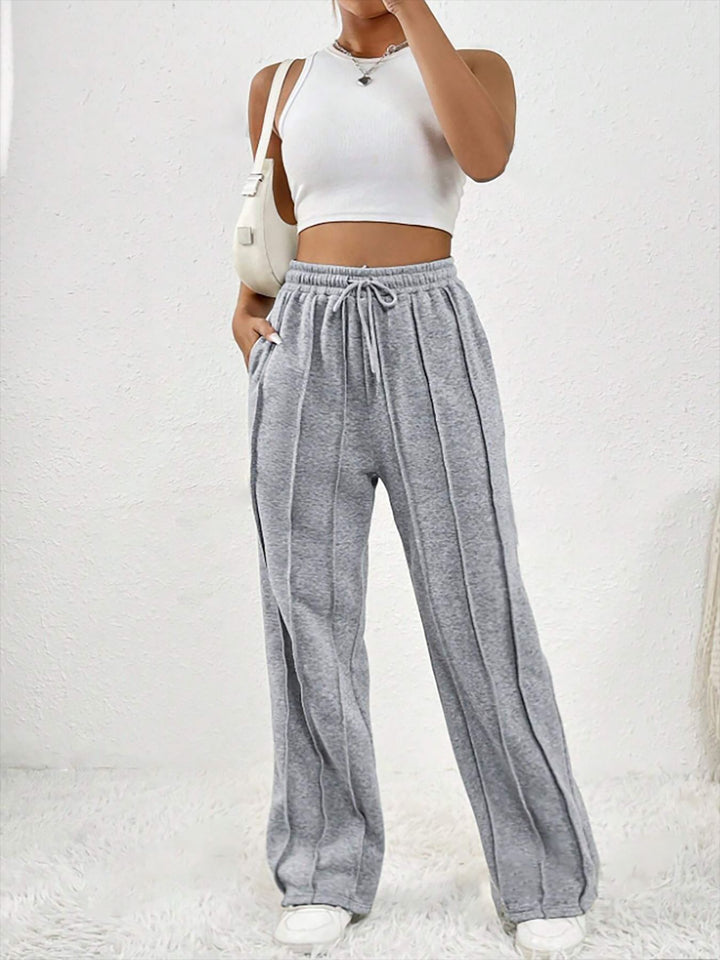 Damen Weite High-Waist Plissee-Hose mit Tunnelzug und markanter Bügelfalte Drune