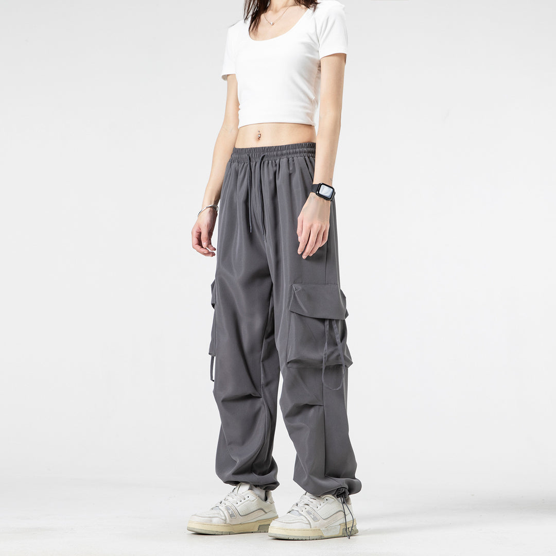 Unisex Weite Cargo‑Hose im Baggy‑Cut mit Tunnelzugbund, Mehrfachklappen und verstellbaren Beinabschlüssen Drune