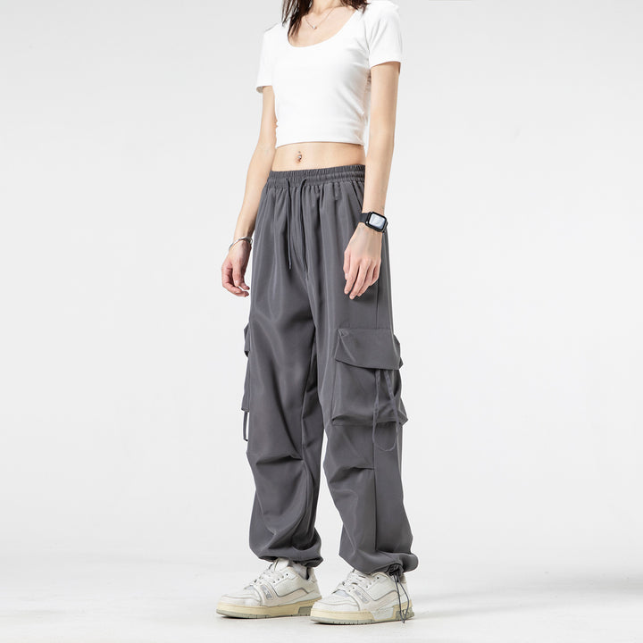 Unisex Weite Cargo‑Hose im Baggy‑Cut mit Tunnelzugbund, Mehrfachklappen und verstellbaren Beinabschlüssen Drune