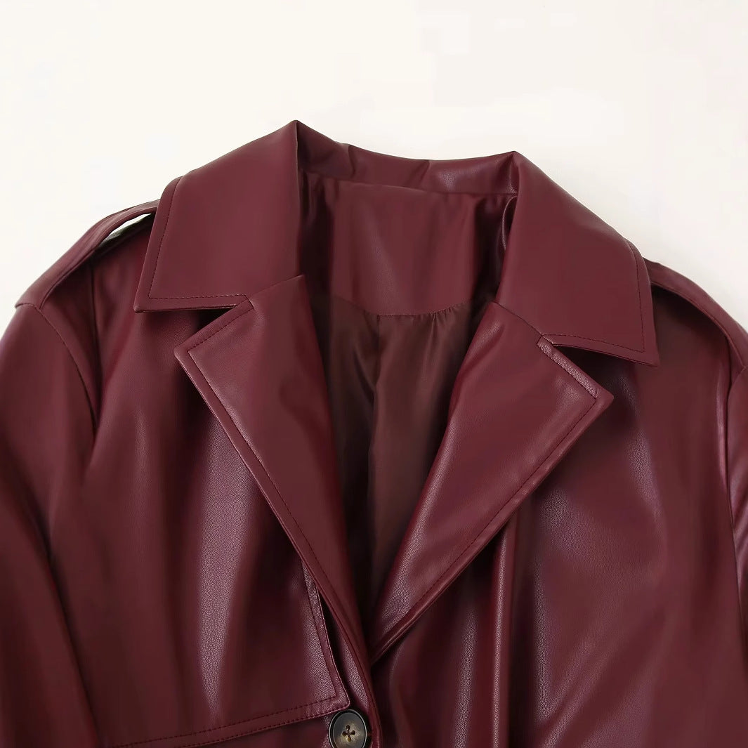 Damen nan langer veganer Trenchcoat in Lederoptik mit Taillengürtel und Schulterklappe Drune