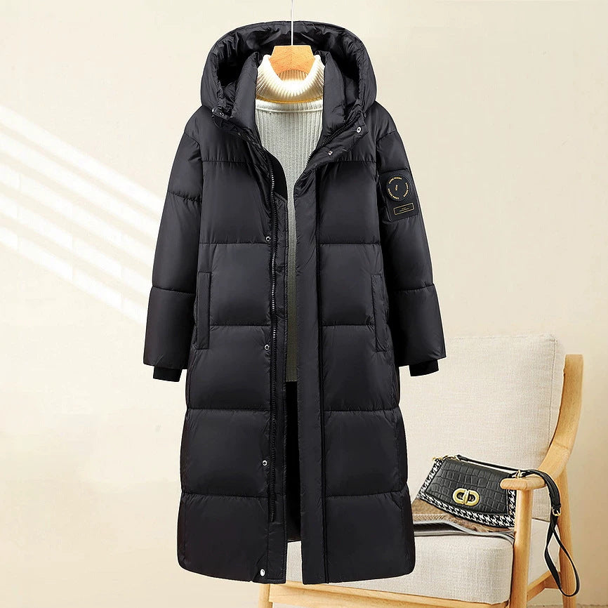 Damen nan extralang gesteppter Thermoparka mit ergonomischer Kapuze, innenliegenden Rippbündchen und verdeckter Frontblende Drune