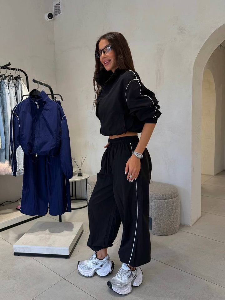Damen Kurzgeschnittenes Windbreaker-Set mit weiter Trackhose und Kontrastpaspel Drune