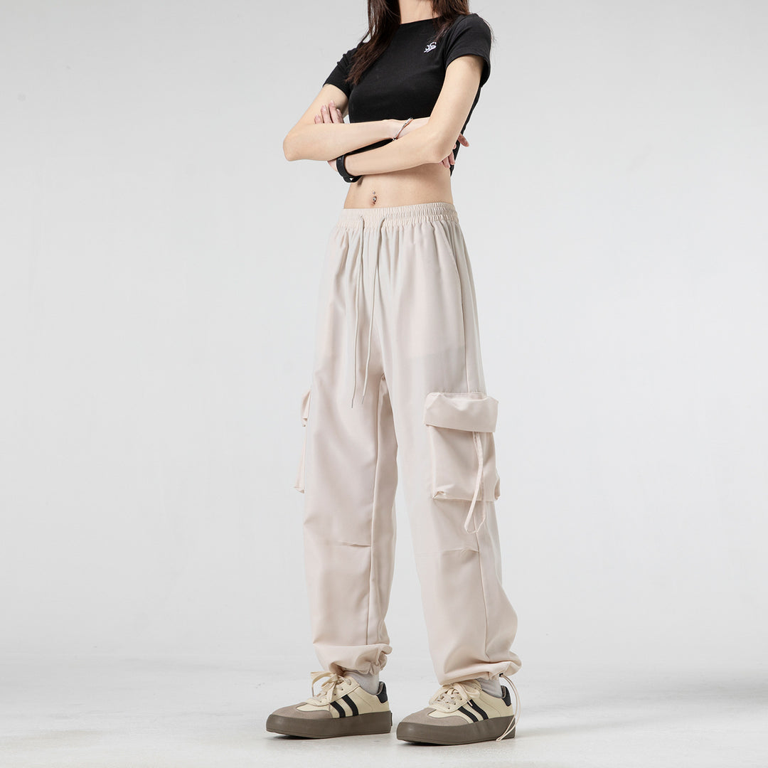 Unisex Weite Cargo‑Hose im Baggy‑Cut mit Tunnelzugbund, Mehrfachklappen und verstellbaren Beinabschlüssen Drune
