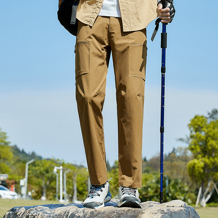Herren Technische Trekkinghose mit Stretch wasserabweisender Oberfläche und Cargo-Taschen Drune