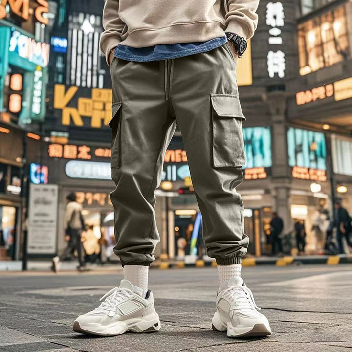 Herren Tapered Cargo-Jogginghose mit Kordelzug, aufgesetzten Klappentaschen und elastischen Bündchen Drune