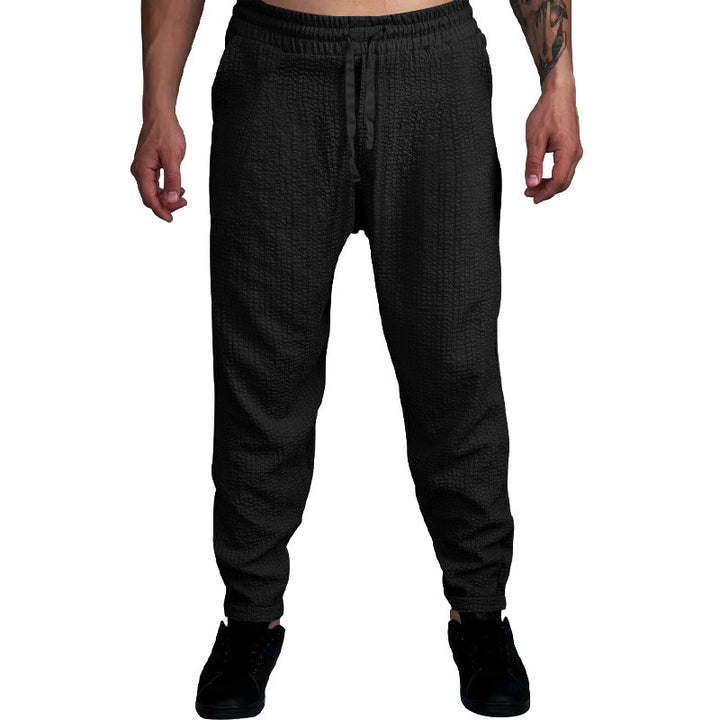 Herren Texturierte tapered Jogginghose mit Elastikbund, Tunnelzug & gerippten Knöchelbündchen Drune