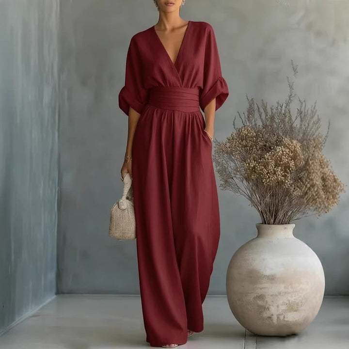 Drune | Eleganter Ärmelloser Jumpsuit mit Tiefem V-Ausschnitt, Taillenbund und Weitem Bein