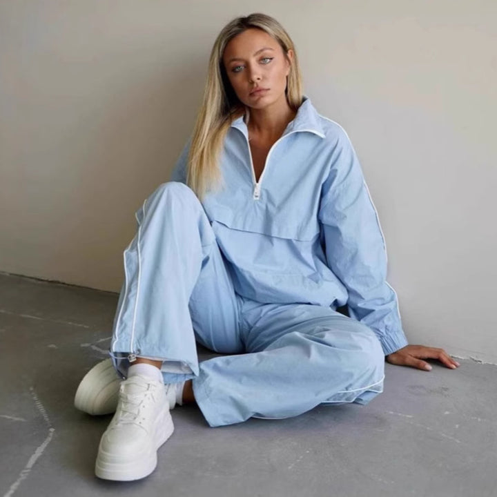 Damen leichtes Half-Zip Windbreaker-Oberteil mit Kängurutasche, elastischen Bündchen und seitlicher Paspel Drune
