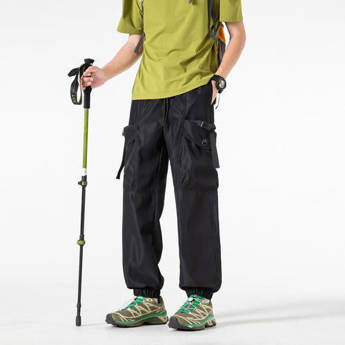 Unisex Weite Technical-Cargo-Jogginghose mit verstellbarem Tunnelzug, großen Klapptaschen und elastischem Knöchelabschluss Drune