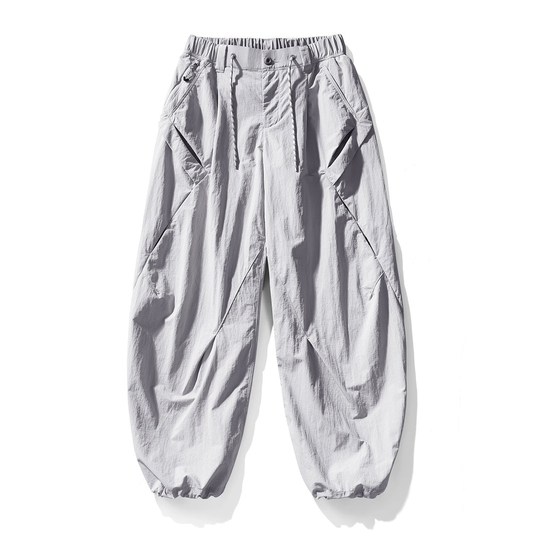 Herren Baggy-Cargohose mit asymmetrischen Eingriffstaschen, Tunnelzugbund und elastischen Knöchelabschlüssen Drune