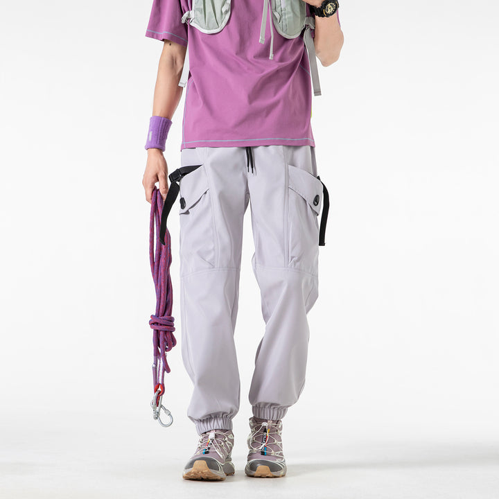 Unisex Weite Technical-Cargo-Jogginghose mit verstellbarem Tunnelzug, großen Klapptaschen und elastischem Knöchelabschluss Drune