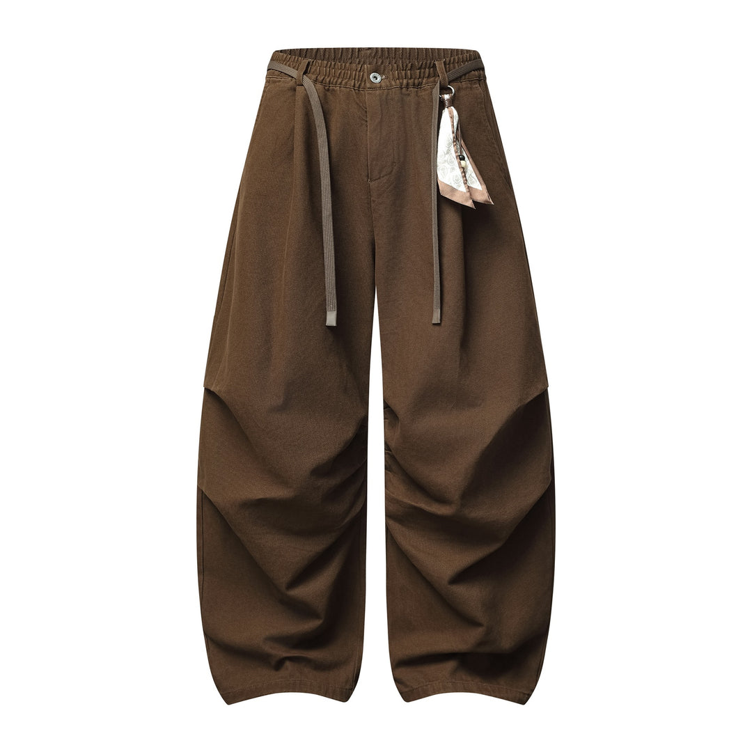 Damen Weite Culotte‑Hose mit Elastikbund, Stufenfalten und dekorativem Tuchanhänger Drune