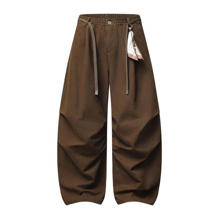 Damen Weite Culotte‑Hose mit Elastikbund, Stufenfalten und dekorativem Tuchanhänger Drune