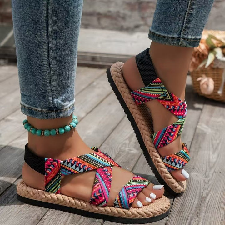 Damen nan flache Espadrille-Riemchensandalen mit geflochtenem Bastrand, elastischem Fersenband und gekreuzten Ethno-Riemen Drune