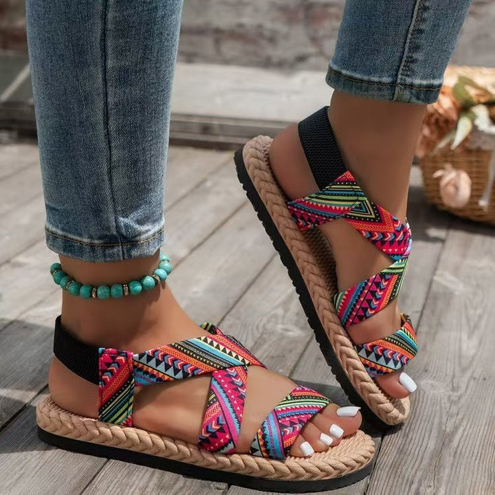 Damen nan flache Espadrille-Riemchensandalen mit geflochtenem Bastrand, elastischem Fersenband und gekreuzten Ethno-Riemen Drune
