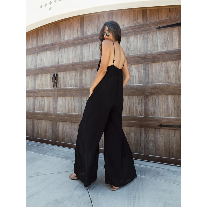 Damen Luftiger Jumpsuit mit weitem Schnitt und verstellbaren Trägern Drune