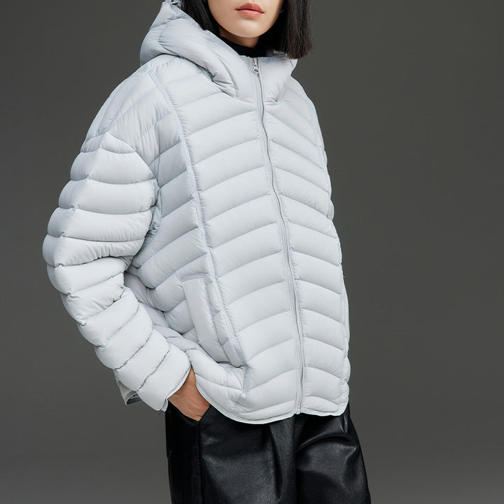 Damen Ultraleichte gesteppte Daunenjacke mit Kapuze und winddichter Außenhülle Drune