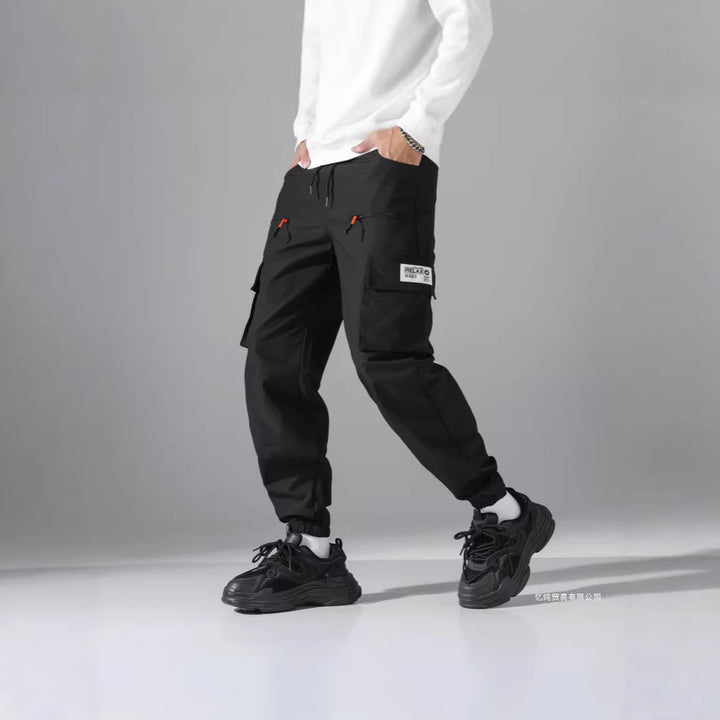 Herren Utility-Cargohose im Joggerstil mit elastischem Bund, Multifachtaschen & Reißverschlusstaschen Drune