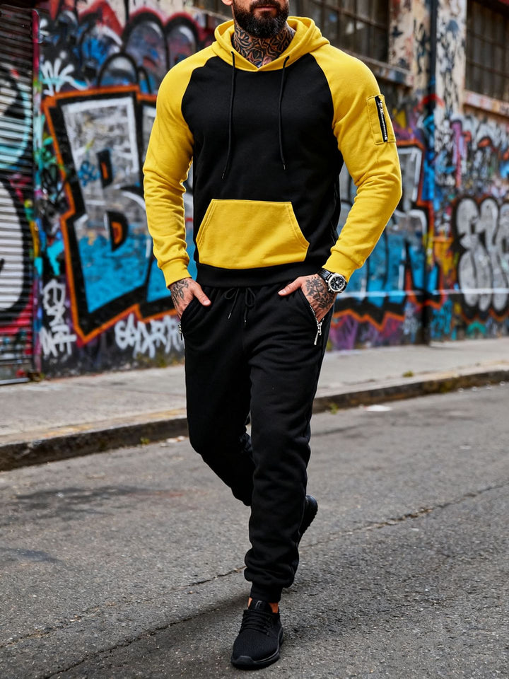 Herren nan zweiteiliges Kapuzen-Sweatset mit Raglanärmeln, Ärmel-Zip-Tasche und tapered Jogginghose Drune