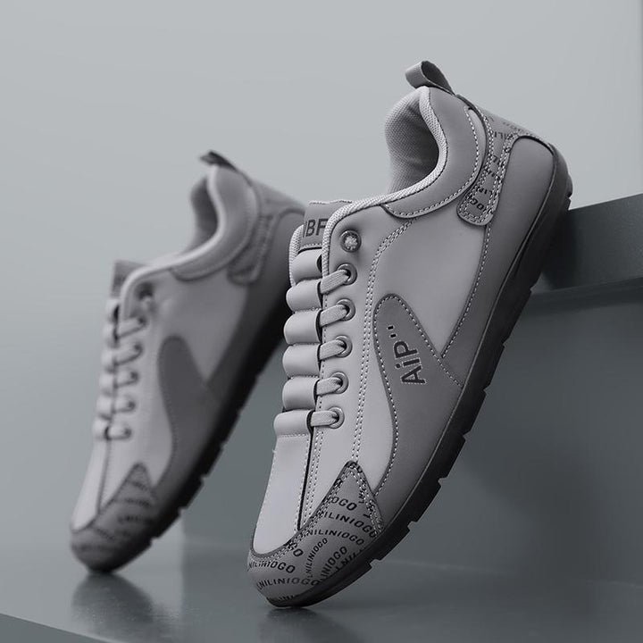 Herren Moderner Low-Top Lederimitat-Sneaker mit gepolstertem Schaft und profilierter Gummisohle Drune