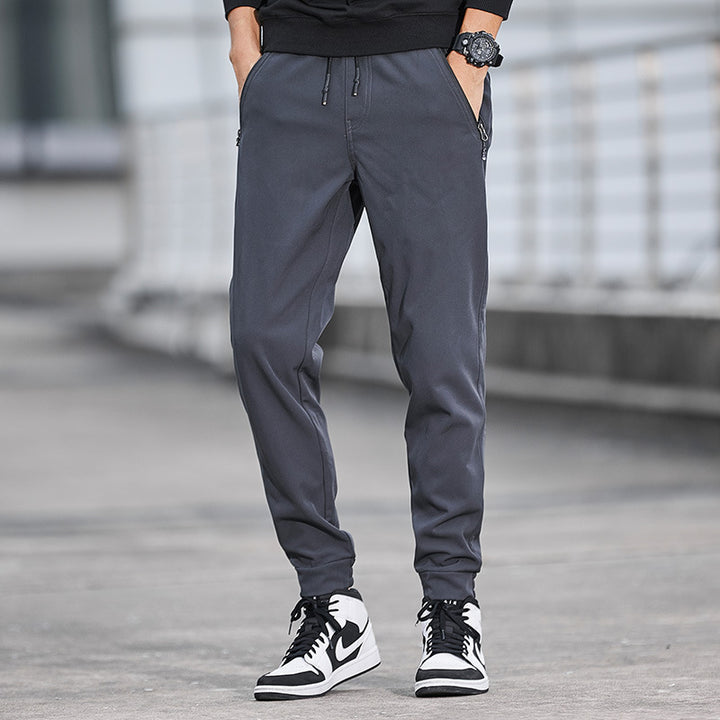 Herren Technische Softshell-Jogginghose mit wasserabweisender Membran, Reißverschlusstaschen und elastischem Kordelbund Drune