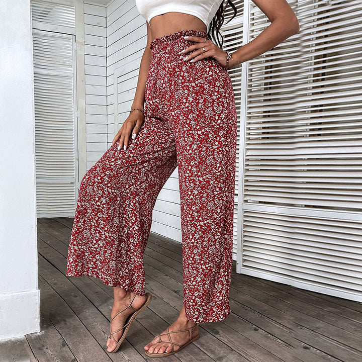 Damen Weite hochgeschnittene Palazzo‑Hose mit floralem Muster und seitlichem Beinschlitz Drune