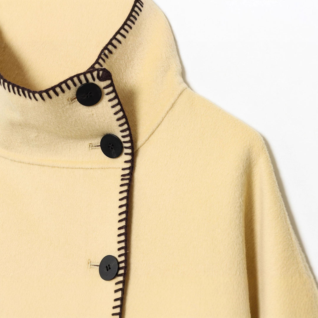 Damen Cape-Mantel mit Stehkragen, asymmetrischer Knopfleiste und Ziernaht Drune