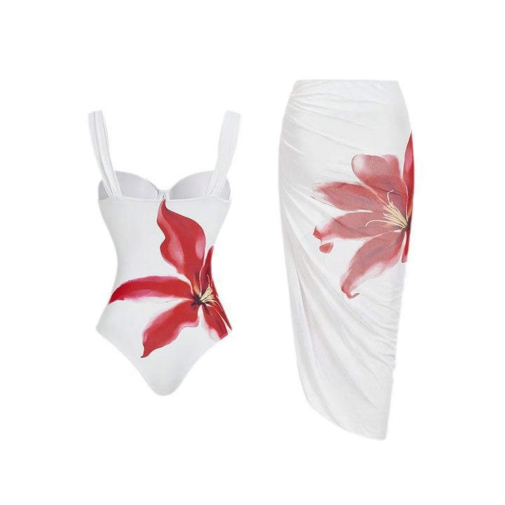Damen Einteiler Badeanzug mit eleganter Blütenapplikation und drapiertem Rock Drune