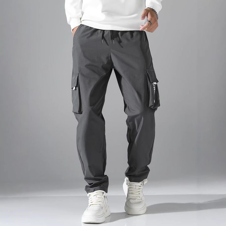 Herren Tapered Cargo-Jogginghose mit elastischem Tunnelzug, multifunktionalen Klapptaschen & ergonomischen Nähten Drune