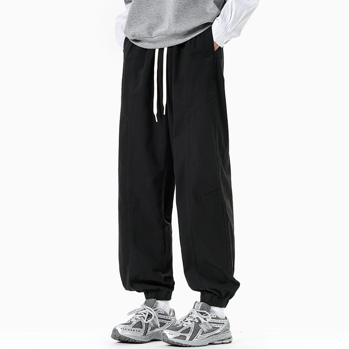 Herren Oversized Utility-Jogginghose aus robustem Baumwollmix mit Kordelbund, seitlichen Cargo‑Taschen & gerippten Bündchen Drune