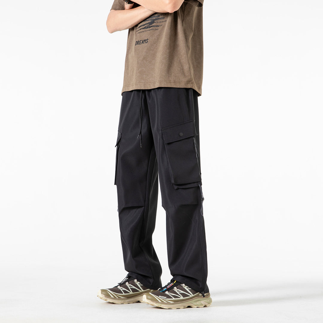 Herren Baggy‑Cargohose im Tech‑Utility‑Stil mit elastischem Tunnelzugbund, großen Klappfächern und Zipper‑Details Drune